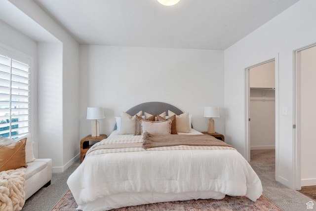 1052 W Azul Meadows Way S, Bluffdale, UT 84065 - bedroom featuring a walk in closet and carpet