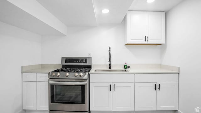 6568 S 5180 W, West Jordan, UT 84081 - kitchen featuring gas range, white cabinets, light countertops, and recessed lighting