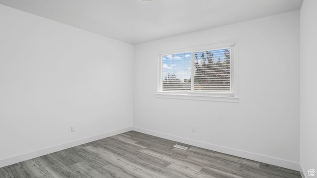 6568 S 5180 W, West Jordan, UT 84081 - spare room featuring wood finished floors