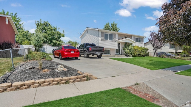 6568 S 5180 W, West Jordan, UT 84081 - split foyer home featuring driveway and brick siding
