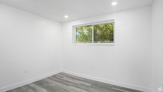 6568 S 5180 W, West Jordan, UT 84081 - empty room with wood finished floors and recessed lighting