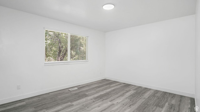 6568 S 5180 W, West Jordan, UT 84081 - unfurnished room with wood finished floors and baseboards
