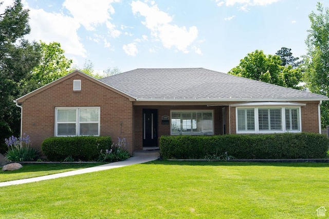 1444 S Beacon Dr E, Salt Lake City, UT 84108 - single story home with brick siding, a front lawn, and roof with shingles