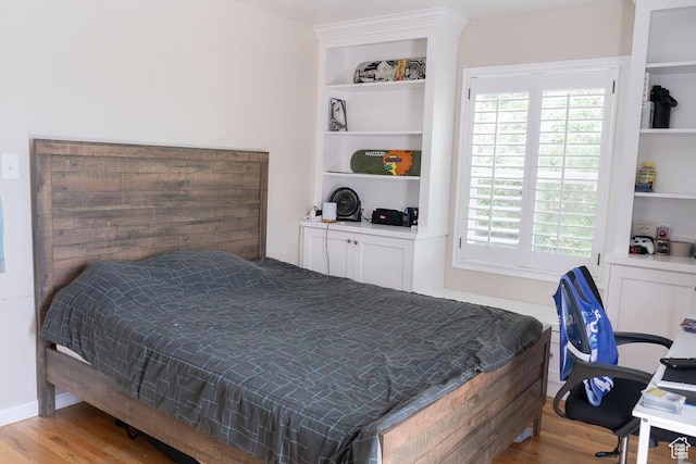 1444 S Beacon Dr E, Salt Lake City, UT 84108 - bedroom featuring wood finished floors