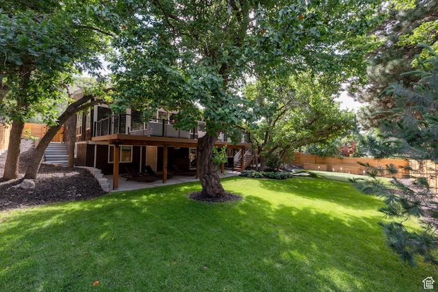 3603 E Macintosh Ln, Cottonwood Heights, UT 84121 - view of yard featuring stairway, a wooden deck, and a patio area