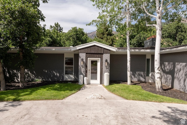 3603 E Macintosh Ln, Cottonwood Heights, UT 84121 - single story home with brick siding