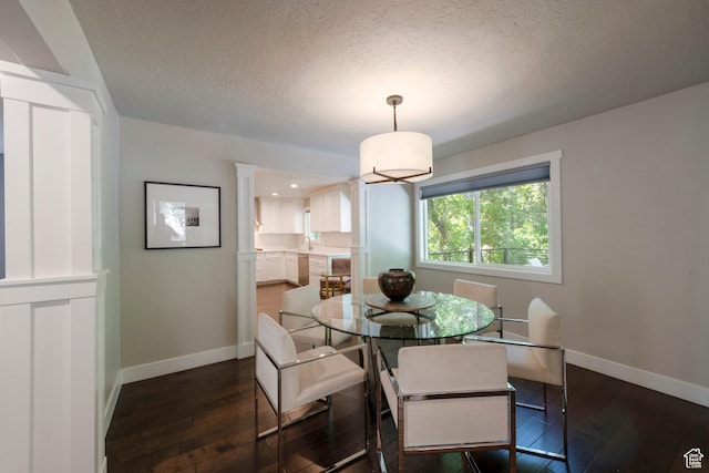 3603 E Macintosh Ln, Cottonwood Heights, UT 84121 - dining space with dark wood-type flooring, a textured ceiling, and recessed lighting