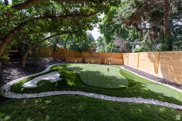 3603 E Macintosh Ln, Cottonwood Heights, UT 84121 - fenced backyard with a putting green