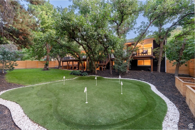 3603 E Macintosh Ln, Cottonwood Heights, UT 84121 - view of yard featuring an area to practice putting and a wooden deck