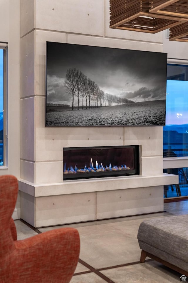 4601 N Toscana Hills Dr, Lehi, UT 84043 - detailed view of a glass covered fireplace and concrete floors