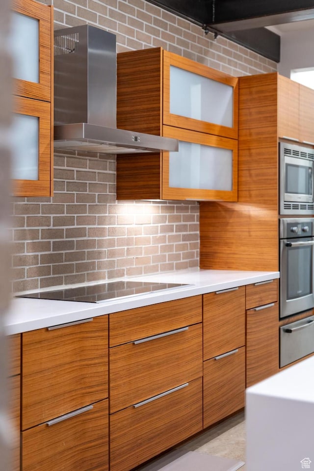4601 N Toscana Hills Dr, Lehi, UT 84043 - kitchen featuring appliances with stainless steel finishes, wall chimney range hood, a warming drawer, modern cabinets, and brown cabinetry