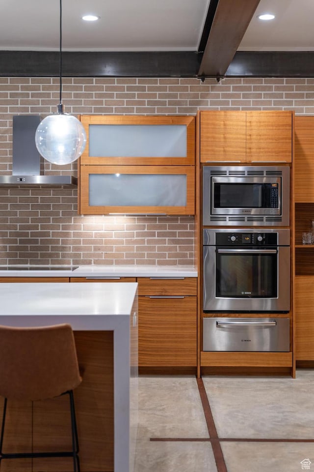 4601 N Toscana Hills Dr, Lehi, UT 84043 - kitchen featuring stainless steel appliances, a warming drawer, wall chimney exhaust hood, light countertops, and tasteful backsplash