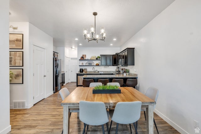 330 N 680 E Unit 330, Vineyard, UT 84059 - dining space with a chandelier, light wood-type flooring, and recessed lighting