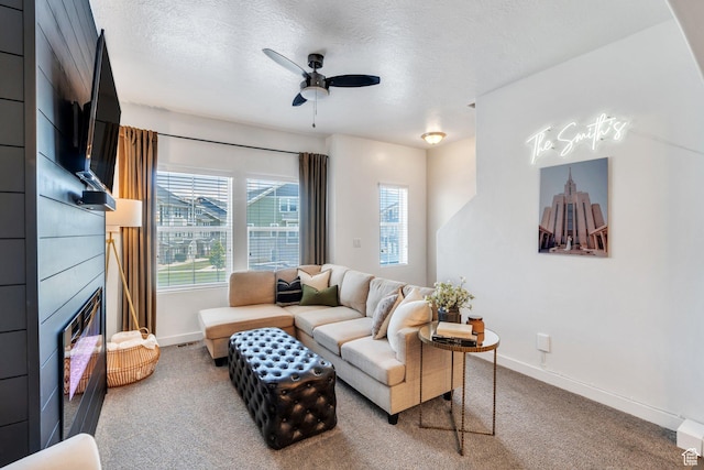 330 N 680 E Unit 330, Vineyard, UT 84059 - living area featuring a ceiling fan, carpet, a textured ceiling, and a fireplace