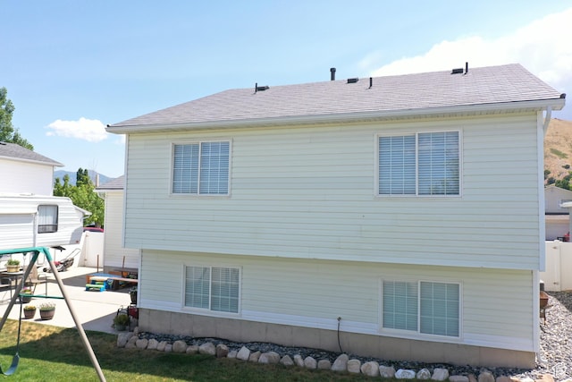 1018 S 810 W, Tooele, UT 84074 - rear view of house featuring a patio
