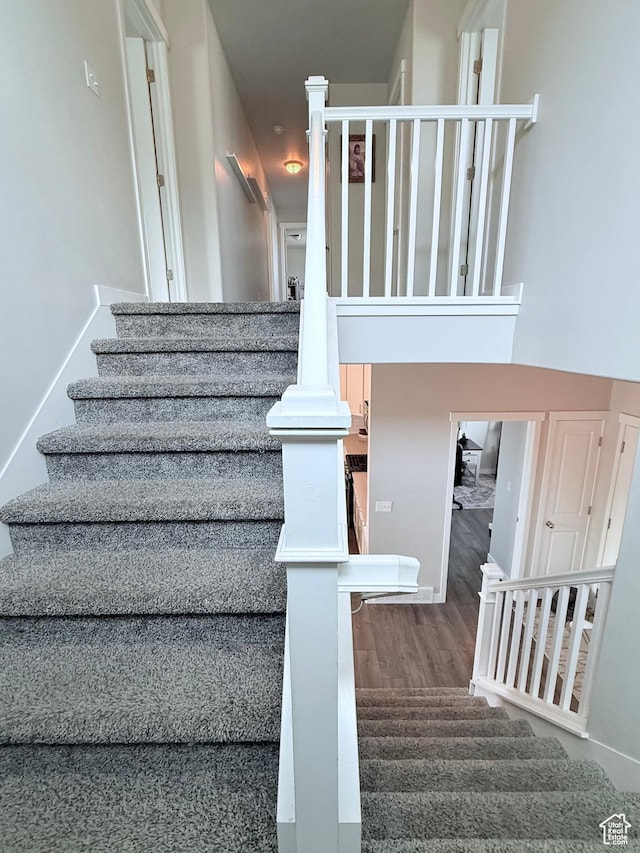 12212 S Sigmon Ln W, Herriman, UT 84096 - staircase featuring wood finished floors