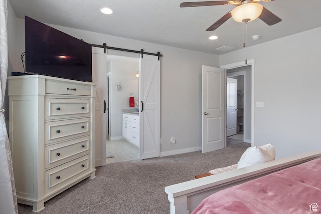 12212 S Sigmon Ln W, Herriman, UT 84096 - bedroom with light colored carpet, recessed lighting, a barn door, ensuite bathroom, and a ceiling fan