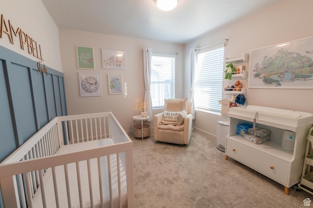 2006 N Red Yearling Dr, Saratoga Springs, UT 84045 - bedroom featuring a crib and carpet flooring