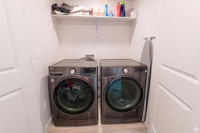 2006 N Red Yearling Dr, Saratoga Springs, UT 84045 - washroom with washer and dryer and wood finished floors