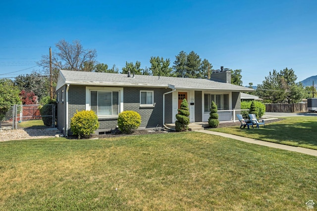 1895 E Brookhill Dr, Cottonwood Heights, UT 84121 - ranch-style home featuring brick siding, a chimney, and a porch