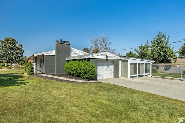 1895 E Brookhill Dr, Cottonwood Heights, UT 84121 - view of side of home featuring a garage, driveway, and a chimney