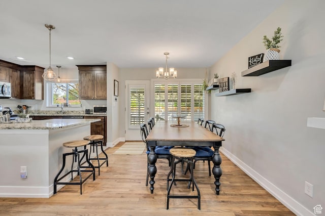 1895 E Brookhill Dr, Cottonwood Heights, UT 84121 - dining room featuring a chandelier, light wood-style flooring, and recessed lighting