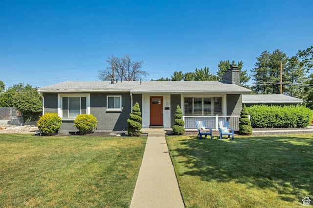 1895 E Brookhill Dr, Cottonwood Heights, UT 84121 - ranch-style house with brick siding, a porch, a front lawn, a chimney, and roof with shingles