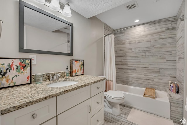 1895 E Brookhill Dr, Cottonwood Heights, UT 84121 - bathroom with vanity, shower / tub combo, a textured ceiling, and recessed lighting