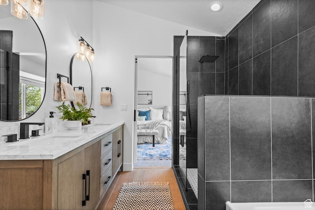 11362 S Mariposa Way E, Sandy, UT 84094 - full bath featuring lofted ceiling, double vanity, ensuite bath, wood finished floors, and a tile shower