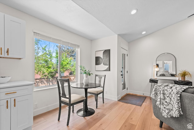 11362 S Mariposa Way E, Sandy, UT 84094 - dining space featuring light wood finished floors and recessed lighting