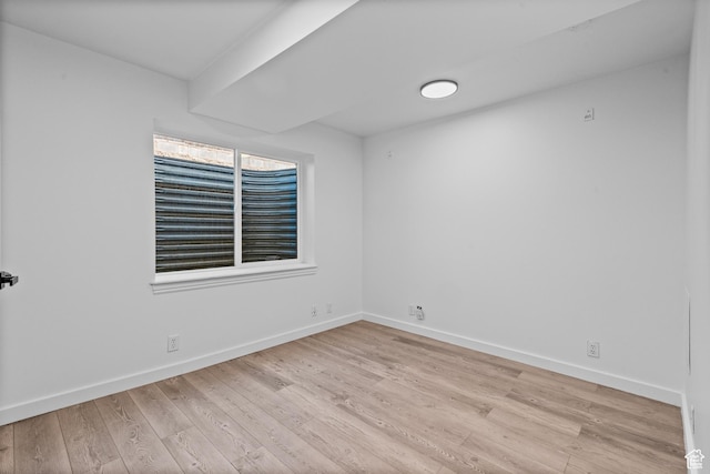 11362 S Mariposa Way E, Sandy, UT 84094 - spare room featuring wood finished floors and baseboards