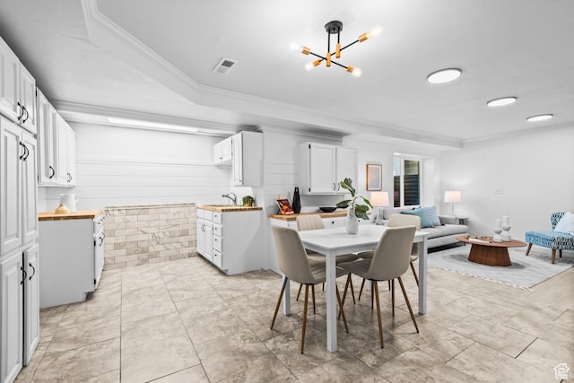 11362 S Mariposa Way E, Sandy, UT 84094 - dining room with ornamental molding and a chandelier