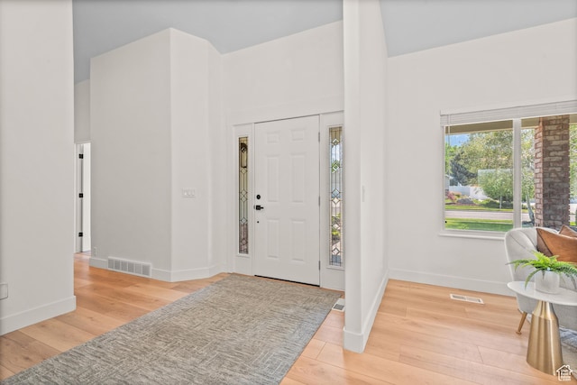 11362 S Mariposa Way E, Sandy, UT 84094 - entryway with plenty of natural light and hardwood / wood-style floors