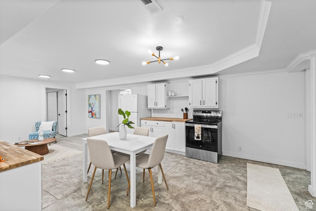 11362 S Mariposa Way E, Sandy, UT 84094 - dining area featuring crown molding and a chandelier