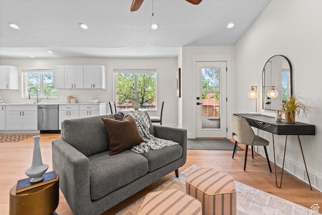 11362 S Mariposa Way E, Sandy, UT 84094 - living room with recessed lighting, a ceiling fan, and light wood-style flooring