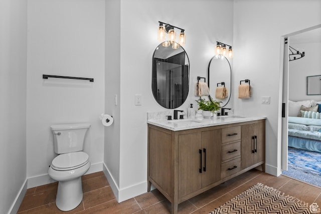 11362 S Mariposa Way E, Sandy, UT 84094 - full bathroom featuring double vanity, ensuite bath, wood finished floors, and a shower