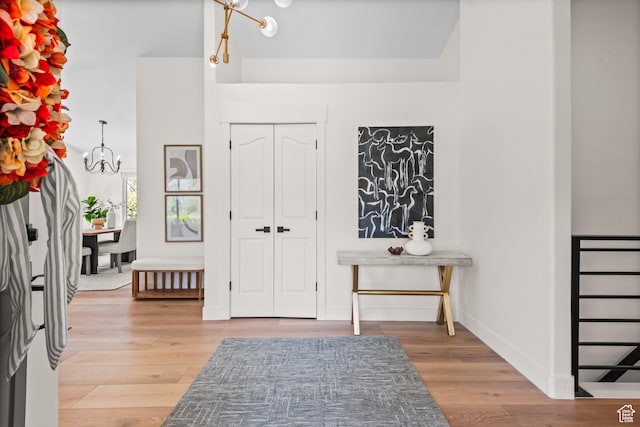 11362 S Mariposa Way E, Sandy, UT 84094 - entrance foyer with a chandelier and light wood finished floors