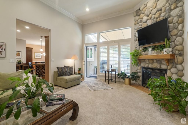4470 S Snowmass Ct, Millcreek, UT 84124 - carpeted living room featuring a fireplace, ornamental molding, and recessed lighting