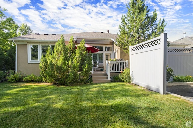 4470 S Snowmass Ct, Millcreek, UT 84124 - back of property with a deck and stucco siding