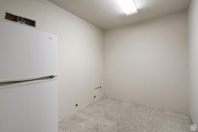 4470 S Snowmass Ct, Millcreek, UT 84124 - washroom featuring carpet floors and a textured ceiling