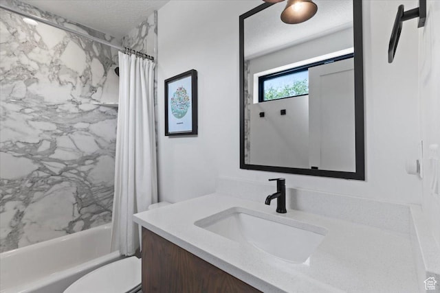 537 S 500 E Unit 106, Salt Lake City, UT 84102 - full bathroom featuring vanity, shower / tub combo with curtain, and a textured ceiling