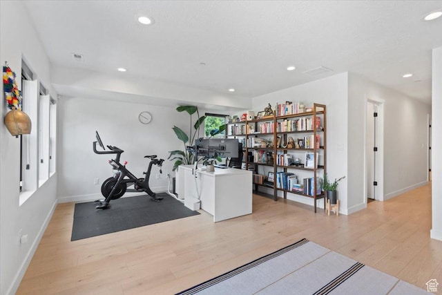 537 S 500 E Unit 106, Salt Lake City, UT 84102 - exercise room featuring light wood-style flooring and recessed lighting