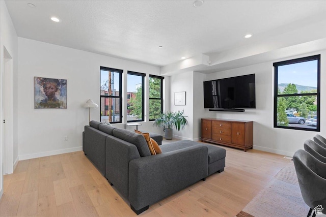 537 S 500 E Unit 106, Salt Lake City, UT 84102 - living room with light wood-type flooring and recessed lighting