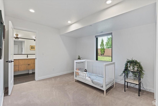 537 S 500 E Unit 106, Salt Lake City, UT 84102 - bedroom featuring light carpet, recessed lighting, and connected bathroom