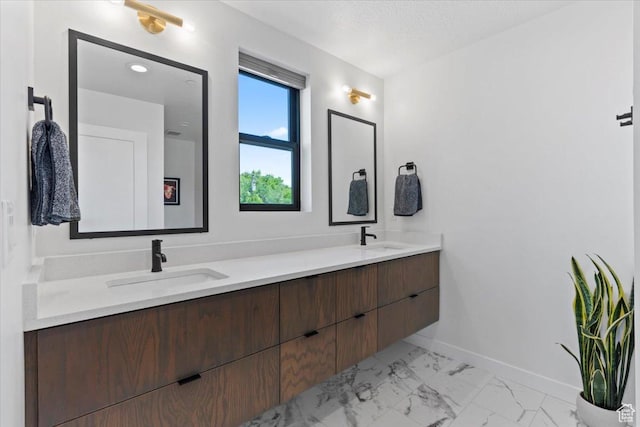 537 S 500 E Unit 106, Salt Lake City, UT 84102 - bathroom with double vanity and marble finish floors