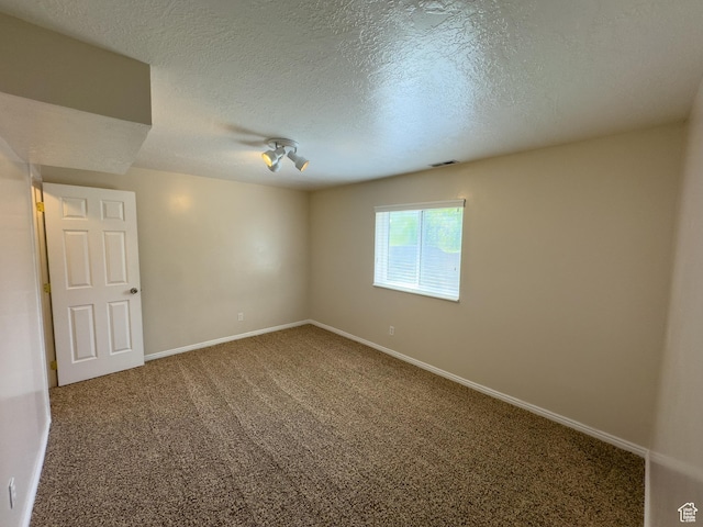 841 E 8600 S, Sandy, UT 84094 - spare room featuring carpet floors and a textured ceiling