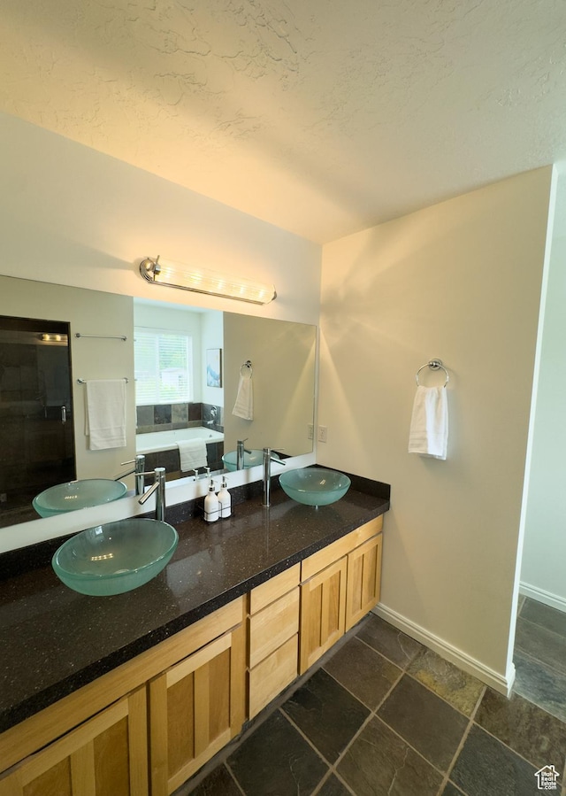 841 E 8600 S, Sandy, UT 84094 - bathroom with a garden tub, double vanity, and stone finish floors
