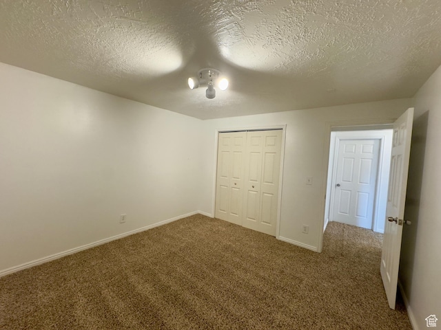 841 E 8600 S, Sandy, UT 84094 - unfurnished bedroom with carpet floors, a textured ceiling, and a closet