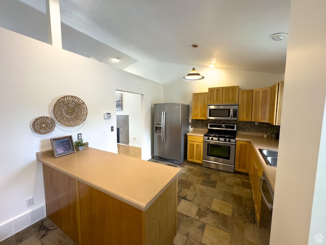 841 E 8600 S, Sandy, UT 84094 - kitchen featuring appliances with stainless steel finishes, vaulted ceiling, a peninsula, decorative backsplash, and dark stone finish flooring
