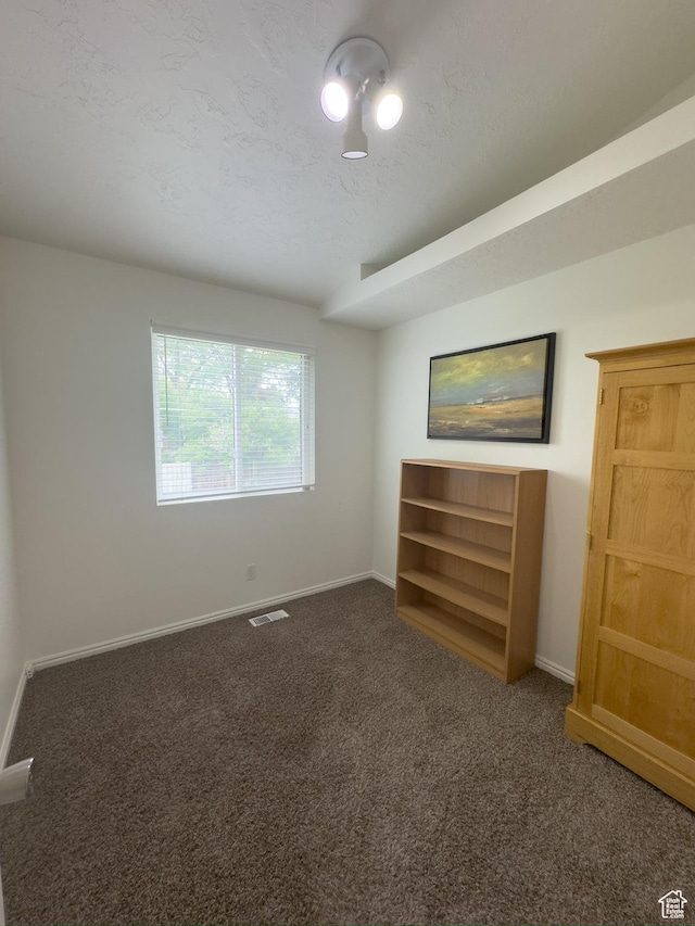 841 E 8600 S, Sandy, UT 84094 - unfurnished bedroom featuring carpet flooring and a textured ceiling